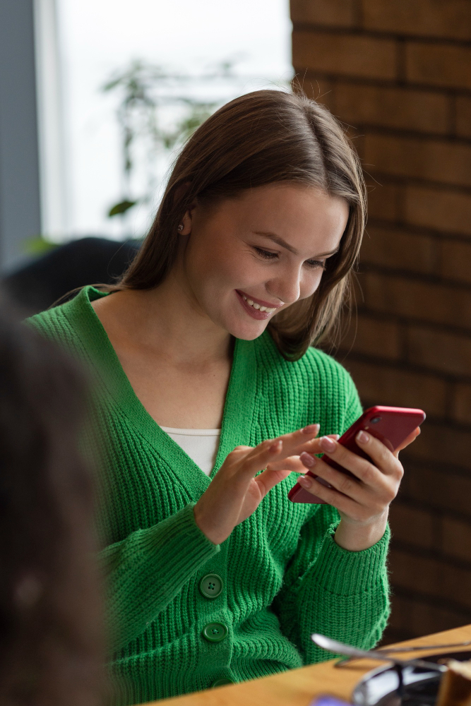 Woman on phone chatting — travel discovery moving into the chat window